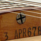 Truss rod adjustment at the heel