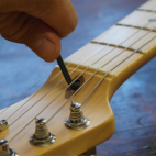 Truss rod adjustment at Headstock